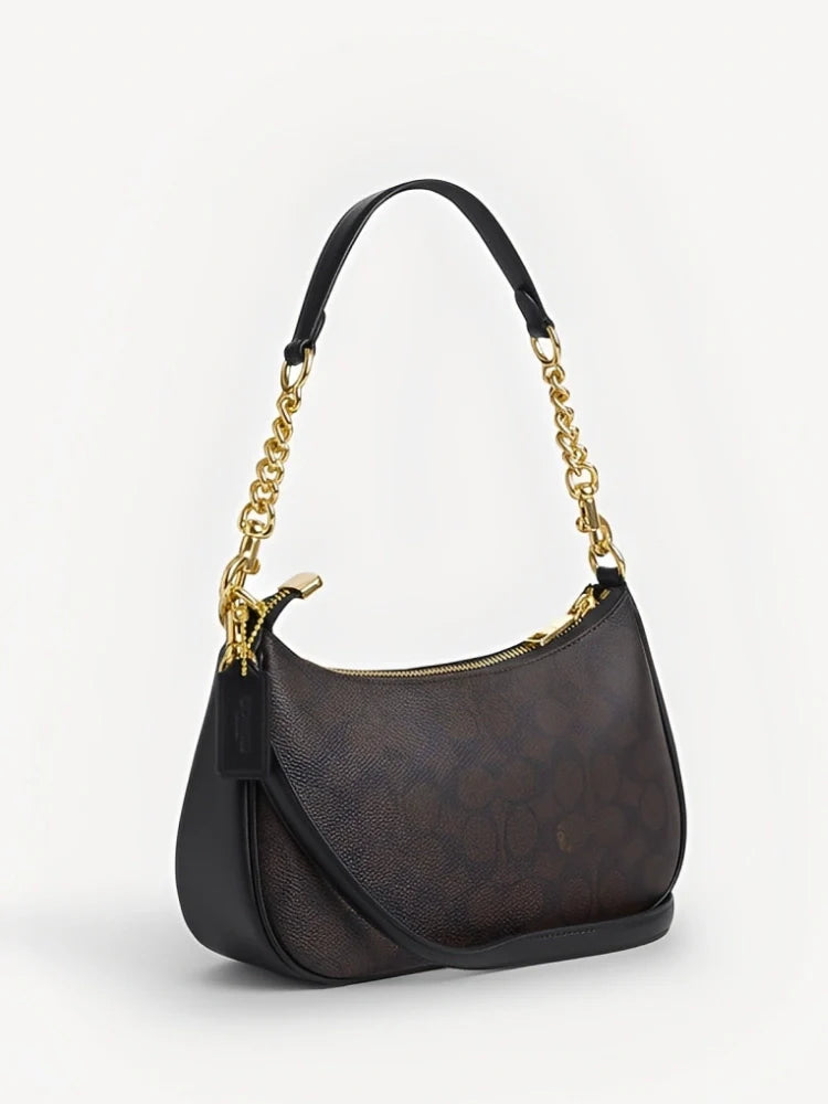 TERI SHOULDER BAG IN SIGNATURE CANVAS